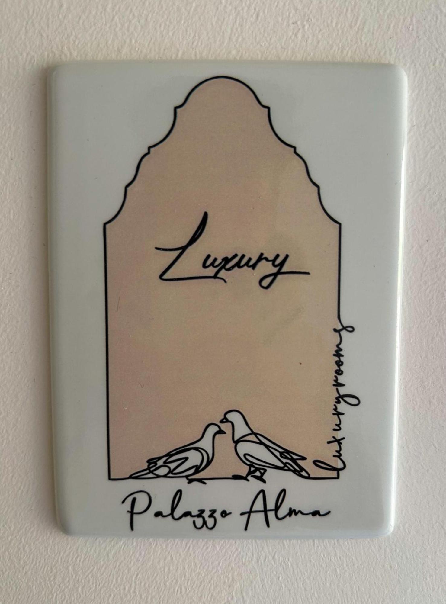 Palazzo Alma Luxury Rooms 卡萨拉诺 外观 照片